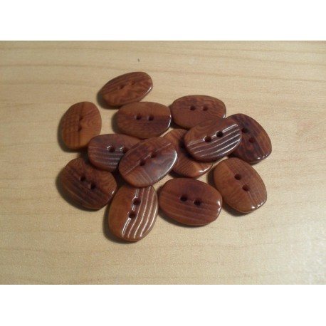 Gomb 1,7x1,3 cm sötétbarna rovátkolt